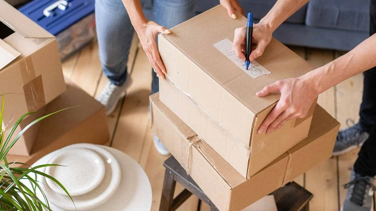 Pastikan memberi label pada kardus, Sumber: angi.com